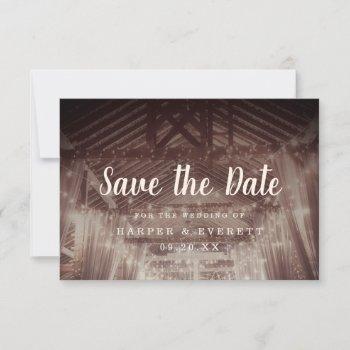 barn rafters with string lights rustic wedding save the date