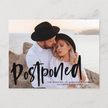 bold brush script photo wedding postponement announcement postcard