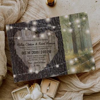 carved heart tree wedding | rustic string lights invitation