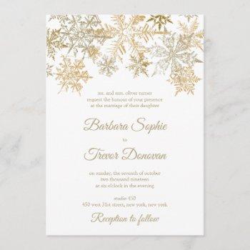 gold snowflakes christmas themed winter wedding invitation