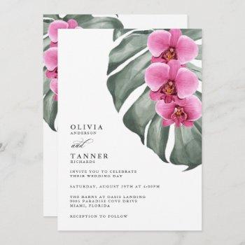 hot pink orchids on monstera tropical wedding invitation
