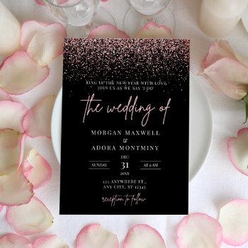 modern black and rose gold new year's eve wedding invitation