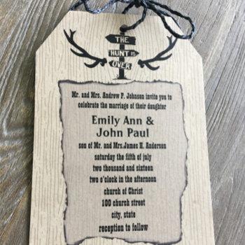 rustic the hunt is over wedding shown on kraft  invitation