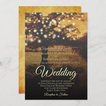 rustic tree with strings of lights elegant wedding invitation