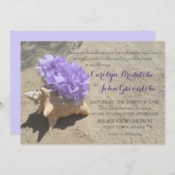 Small Seashell And Purple Hydrangea In Sand Front View