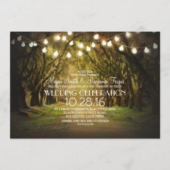 string of lights trees path rustic wedding invites