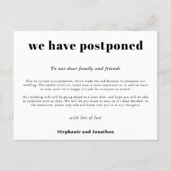 wedding postponement simple typographical white announcement postcard