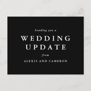 wedding update change the date black and white postcard