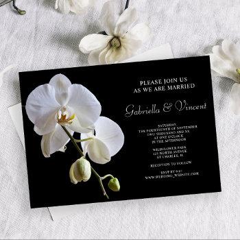 Small White Orchid Flowers On Black Wedding Front View
