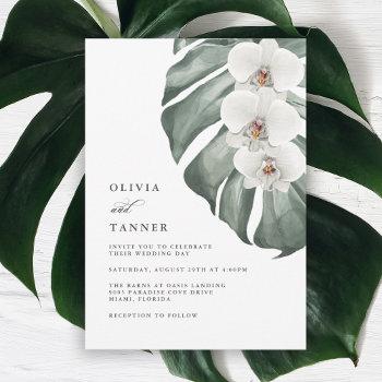 white orchids on monstera tropical  wedding invitation